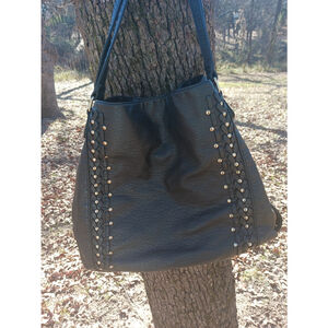 Under one sky handbag